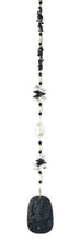 Load image into Gallery viewer, Carved Dragon suncatcher is decorated with crystals and Snowflake Obsidian gemstones
