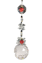 Load image into Gallery viewer, This beautiful Crystal ball suncatcher which is decorated with a Lady Bugs and Snowflake Obsidian
