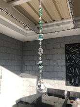 Load and play video in Gallery viewer, Bee &amp; flowers 50mm Crystal starburst suncatcher, is decorated with crystals and malachite.
