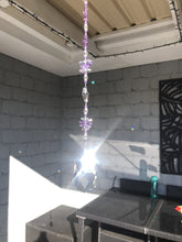 Load and play video in Gallery viewer, 79mm Crystal almond suncatcher, is decorated with crystals and amethyst
