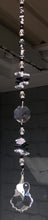 Load and play video in Gallery viewer, Ying &amp; Yang heart, starburst suncatcher is decorated with crystals and snowflake obsidian gemstones.
