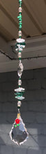 Load and play video in Gallery viewer, Red Rose starburst suncatcher is decorated with crystals and malachite gemstones.
