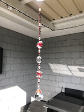 Load and play video in Gallery viewer, Mushroom 50mm Crystal starburst suncatcher, is decorated with crystals and garnet.
