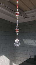 Load and play video in Gallery viewer, Elephant 50mm Crystal starburst suncatcher, is decorated with crystals and carnelian
