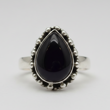 Load image into Gallery viewer, Sterling Silver ring with a black onyx teardrop-shaped gemstone on a light gray background
