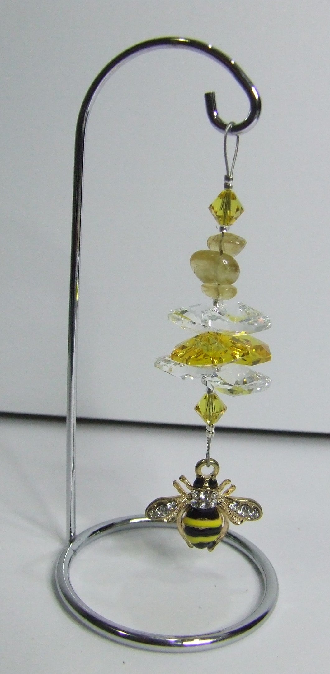 Bee - yellow crystal suncatcher is decorated with citrine gemstones and come on this amazing small stand.