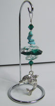 Load image into Gallery viewer, Dolphin -green crystal suncatcher is decorated with malachite gemstones and come on this amazing small stand.
