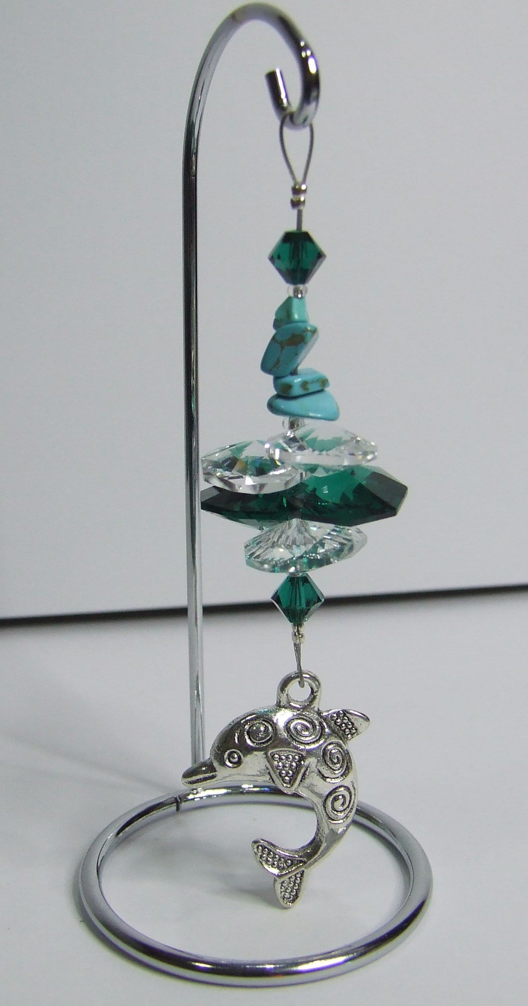 Dolphin -green crystal suncatcher is decorated with malachite gemstones and come on this amazing small stand.