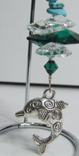 Load image into Gallery viewer, Dolphin -green crystal suncatcher is decorated with malachite gemstones and come on this amazing small stand.
