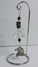 Load image into Gallery viewer, Eagle - black crystal suncatcher is decorated with hematite gemstones and come on this amazing small stand.
