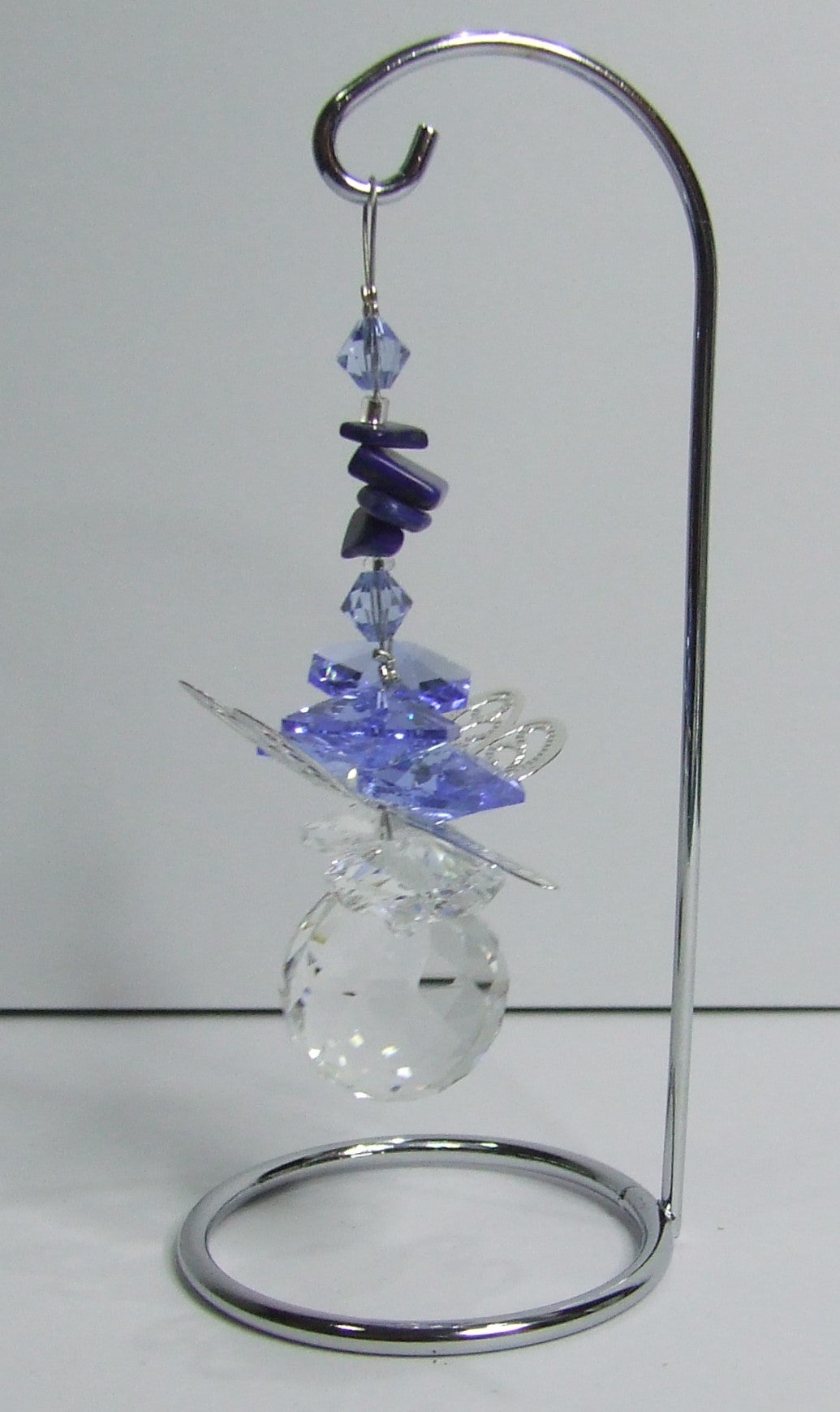 Dragonfly -blue crystal suncatcher is decorated with lapis lazuli gemstones and come on this amazing small stand.