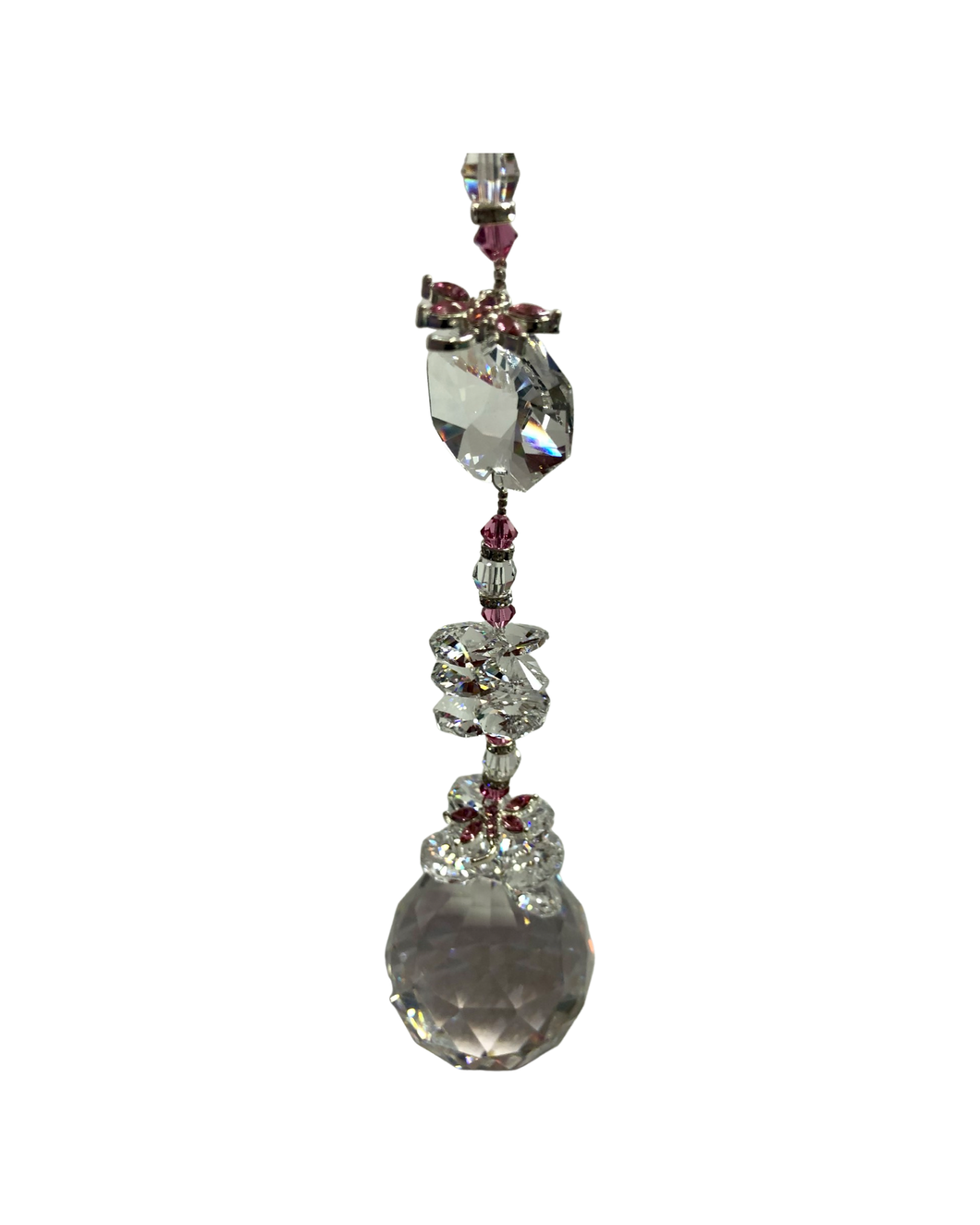 Stunning 50mm crystal ball suncatcher is decorated with dragonflies and rose quartz.