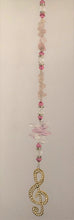 Load image into Gallery viewer, This beautiful Music Note Clef suncatcher which is decorated with crystals and Rose Quartz
