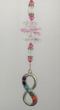 Load image into Gallery viewer, This beautiful Chakra Infinity suncatcher which is decorated with crystals and Moonstone
