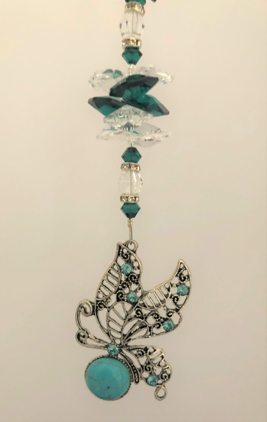 This beautiful sparkle butterfly suncatcher which is decorated with crystals & malachite