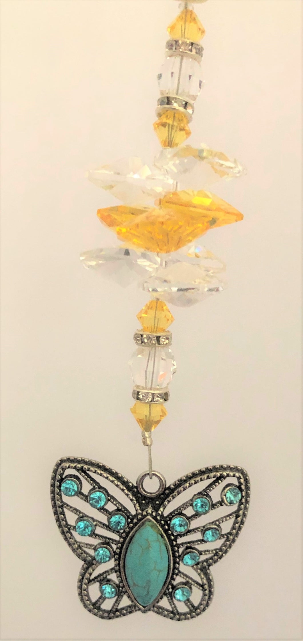 This beautiful Blue butterfly suncatcher which is decorated with  crystals & Citrine