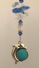 Load image into Gallery viewer, This beautiful Dolphin suncatcher which is decorated with crystals and Lapis Lazuli
