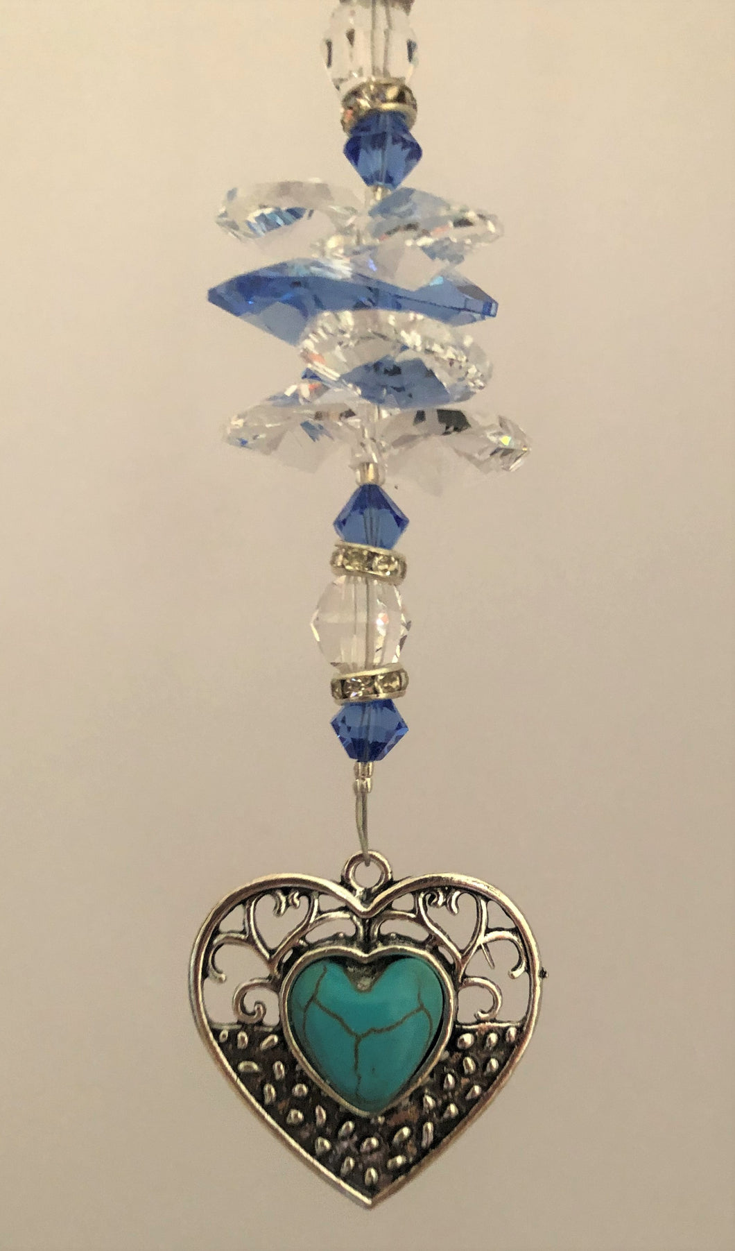 This beautiful Blue Heart suncatcher which is decorated with crystals and Lapis Lazuli