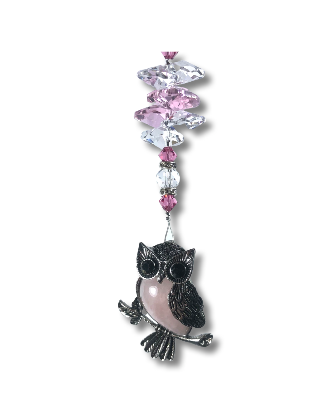 Rose Quartz Owl Suncatcher decorated with rose quartz and crystals.