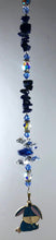 Load image into Gallery viewer, Eeyore suncatcher decorated with crystals and lapis lazuli gemstones
