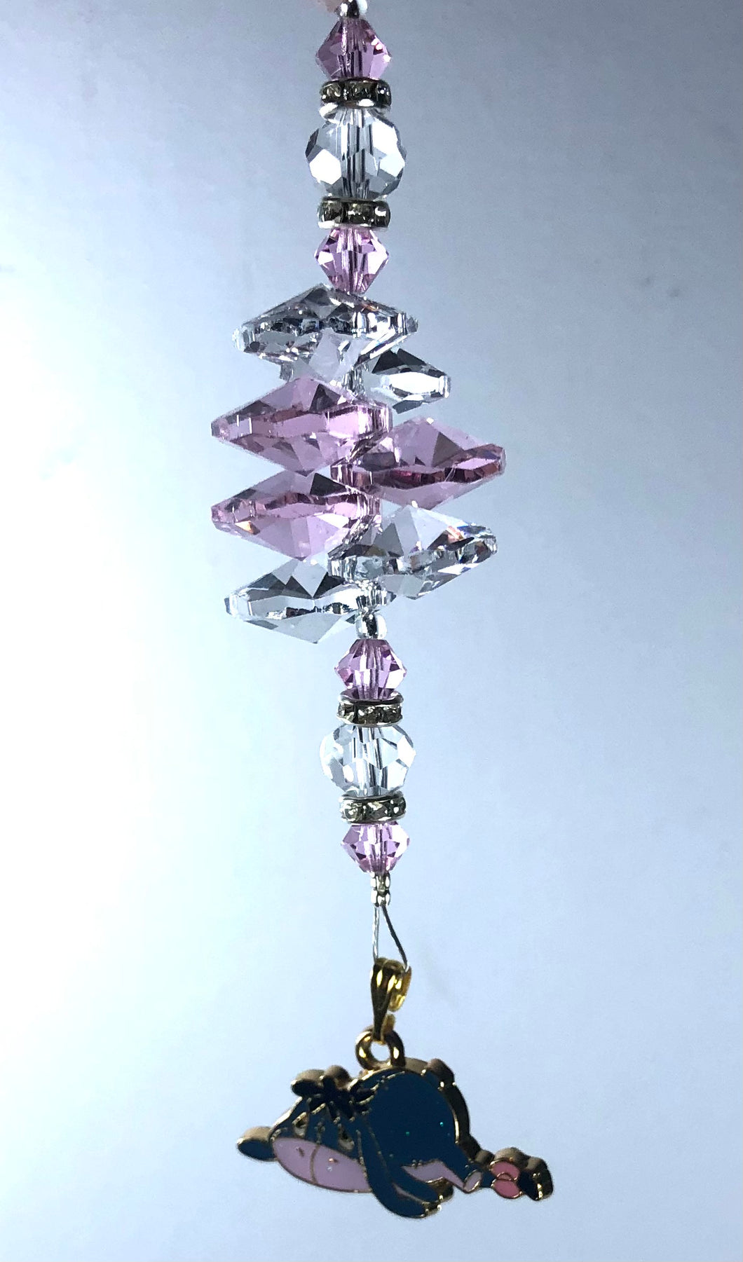 Eeyore suncatcher decorated with crystals and rose quartz gemstones