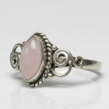 Load image into Gallery viewer, Sterling Silver ring with a rose quartz gemstone on a light gray background
