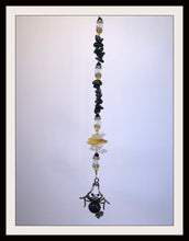 Load image into Gallery viewer, This beautiful Spider Black suncatcher which is decorated with crystals and Snowflake Obsidian
