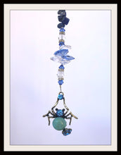 Load image into Gallery viewer, This beautiful Spider blue suncatcher which is decorated with crystals and Lapis Lazuli
